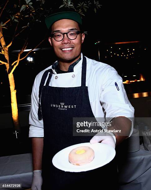 Chef Scott Levine poses with his Sunny Side Up Donuts at Chicken Coupe hosted by Whoopi Goldberg and Andrew Carmellini at The William Vale on October...