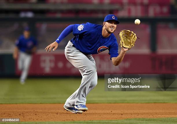 Chicago Cubs Third base Kris Bryant [10177] catches an infield chopper during an MLB game between the Chicago Cubs and the Los Angeles Angels of...