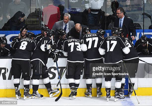 Kings head coach Darryl Sutter talks to the team during a time out during game 1 of the first round of the NHL Western Conference playoffs between...