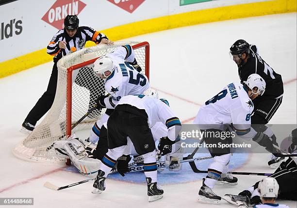 Sharks Matt Irwin accidentally bumps the puck in for a Kings goal by Kings Justin Williams during game 6 of the first round of the Stanley Cup...