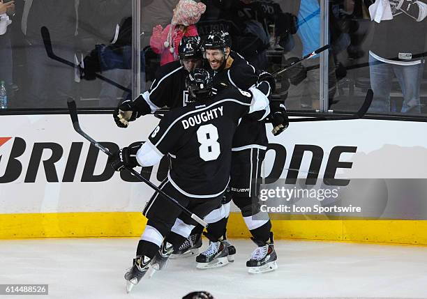 The Kings celebrate a goal during game 6 of the first round of the Stanley Cup Playoffs between the San Jose Sharks and the Los Angeles Kings at the...