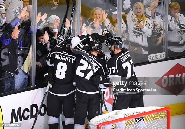 The Kings celebrate a goal during game 6 of the first round of the Stanley Cup Playoffs between the San Jose Sharks and the Los Angeles Kings at the...