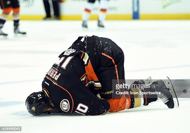 Anaheim Ducks Right Wing Corey Perry [2809] goes down on the ice after being injured on a check during game 5 of round 2 of the Stanley Cup Playoffs...