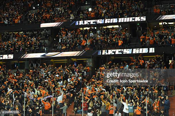 Ducks fans get pumped up in the third period during game 5 of round 2 of the Stanley Cup Playoffs between the Calgary Flames and the Anaheim Ducks at...