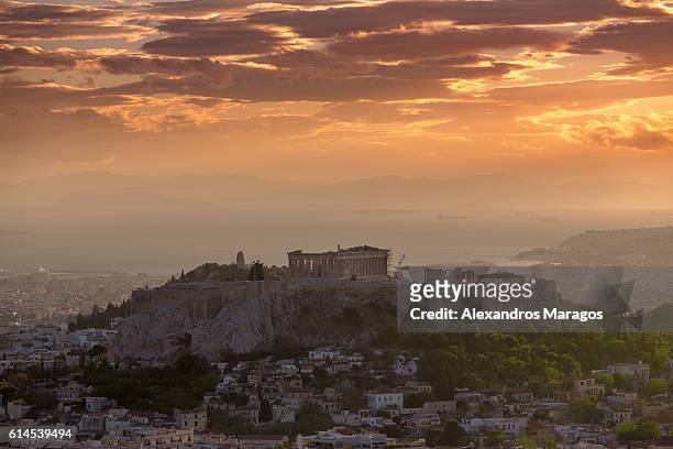 the acropolis of athens at sunset - ancient greece stock pictures, royalty-free photos & images
