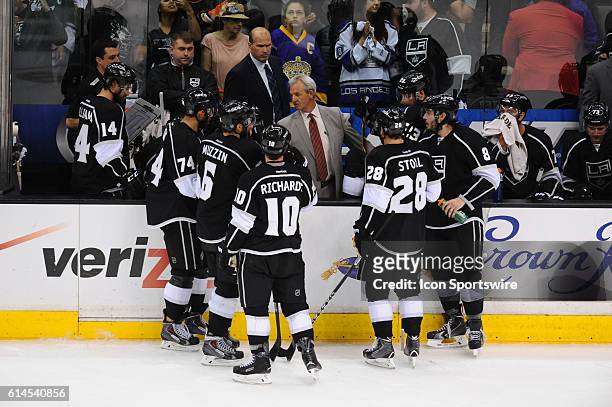 Kings head coach Darryl Sutter talks with the team during a time out during game 6 of the second round of the Stanley Cup Playoffs between the...