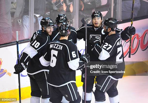 Los Angeles Kings Right Wing Dustin Brown [2289] celebrates with his team mates after scoring the third goal of the game in the first period during...