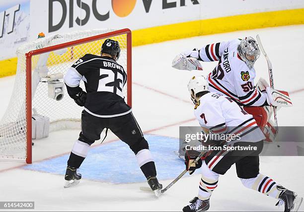 Los Angeles Kings Right Wing Dustin Brown [2289] scores the Kings third goal of the game in the first period against Chicago Blackhawks Goalie Corey...