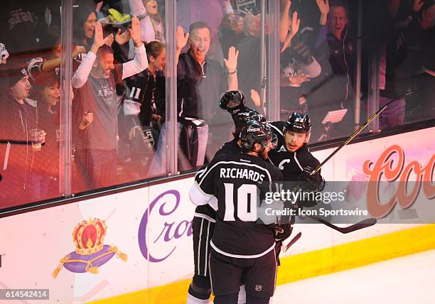 Los Angeles Kings Right Wing Dustin Brown [2289] celebrates with his team mates after scoring the third goal of the game in the first period during...