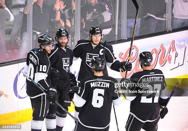 Los Angeles Kings Right Wing Dustin Brown [2289] celebrates with his team mates after scoring the third goal of the game in the first period during...