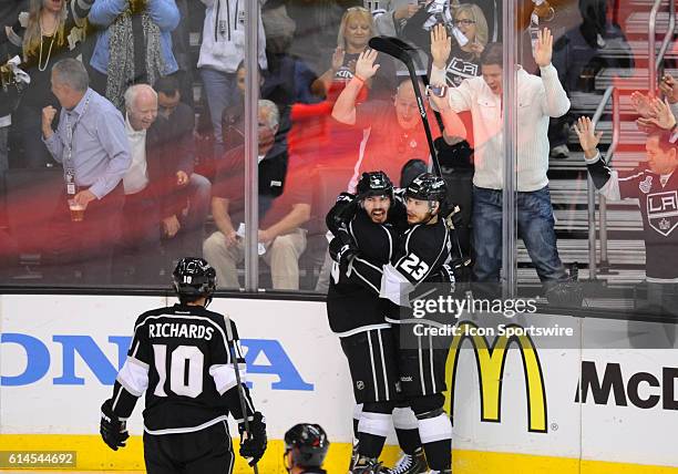 Los Angeles Kings Center Mike Richards [3483], Los Angeles Kings Defenseman Drew Doughty [6495], and Los Angeles Kings Right Wing Dustin Brown [2289]...