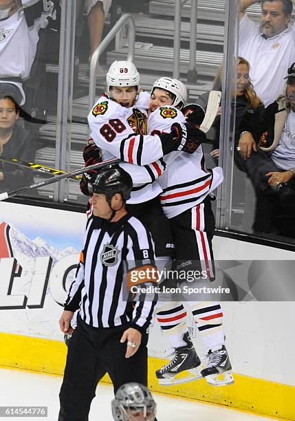 Chicago Blackhawks Right Wing Patrick Kane [6040] and Chicago Blackhawks Center Andrew Shaw [8702] celebrate scoring the Blackhawks fourth goal of...