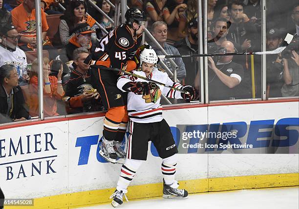 Chicago Blackhawks Right Wing Andrew Shaw [8702] checks Anaheim Ducks Defenseman Sami Vatanen [7677] during game 7 of the NHL Western Conference...