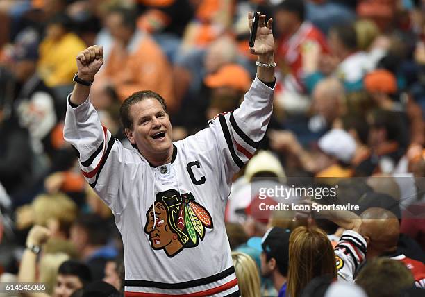 Blackhawks fan celebrates after they scored their fifth goal of the game in the third period during game 7 of the NHL Western Conference Final...