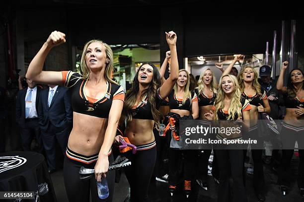 The Ducks power players celebrate after the Ducks score their third goal of the game in the third period during game 7 of the NHL Western Conference...