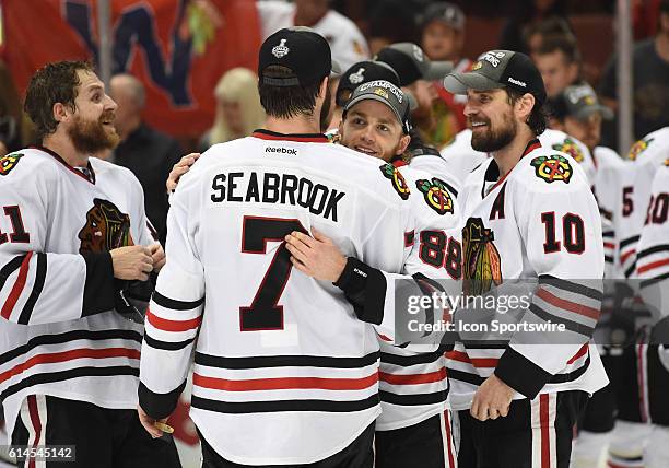 Chicago Blackhawks Right Wing Patrick Kane [6040] and Chicago Blackhawks Defenseman Brent Seabrook [3522] celebrate winning the Western Conference...