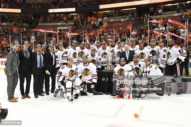 The Blackhawks pose with the Campbell Bowl after defeating the Ducks to win the Western Conference during game 7 of the NHL Western Conference Final...