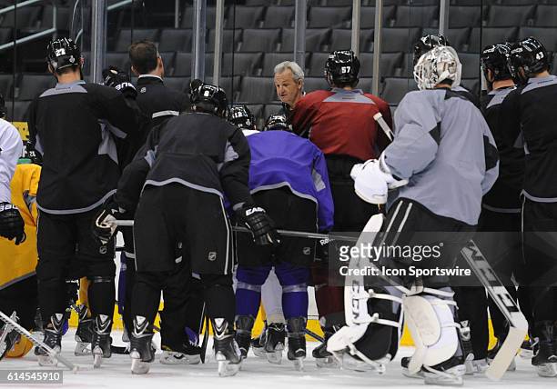 Los Angeles Kings coach Darryl Sutter talks to his team during Kings practice on Media Day for the Stanley Cup Finals at STAPLES Center in Los...