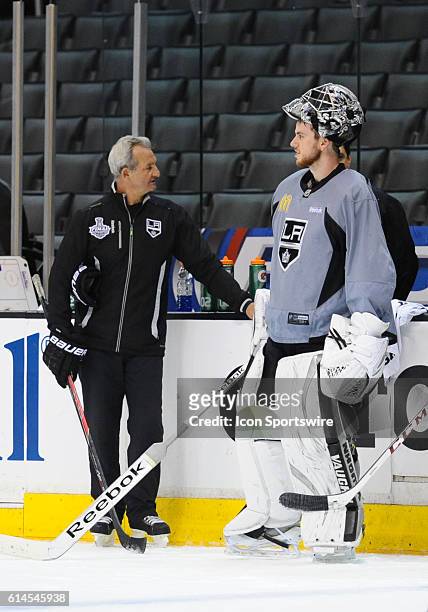 Los Angeles Kings coach Darryl Sutter talks with Los Angeles Kings Goalie Martin Jones [6752] during Kings practice on Media Day for the Stanley Cup...
