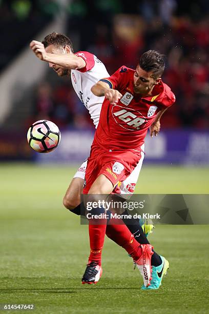 Sergio Guardiola of Adelaide United compete for the ball during the round two A-League match between Adelaide United and the Western Sydney Wanderers...
