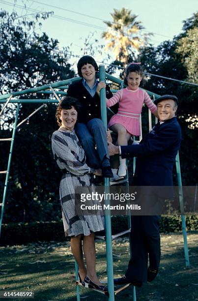 Actor Gene Kelly with his wife Jeanne Coyne, son Tim and daughter Bridget, pose for a family portrait in 1971 in Los Angeles, California.