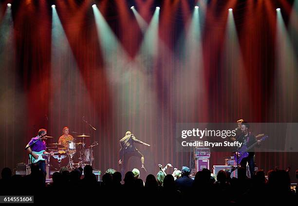 Drummer Elaine Bradley, guitarist Chris Allen, singer Tyler Glenn and bassist Branden Campbell of Neon Trees perform during the Scleroderma Research...