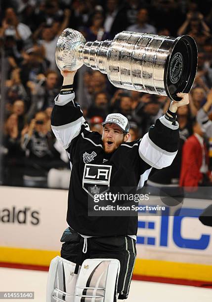 Los Angeles Kings Goalie Jonathan Quick [5348] skates with the Stanley Cup during the post game celebration of the Stanley Cup Final between the New...