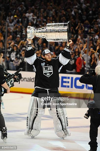 Los Angeles Kings Goalie Jonathan Quick [5348] skates with the Stanley Cup during the post game celebration of the Stanley Cup Final between the New...