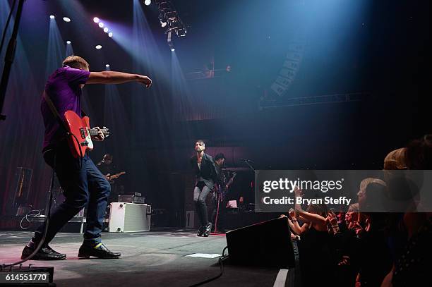 Guitarist Chris Allen and singer Tyler Glenn of Neon Trees perform during the Scleroderma Research Foundations' Cool Comedy - Hot Cuisine fundraiser...