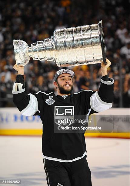 Los Angeles Kings Defenseman Alec Martinez [5300] skates with the Stanley Cup during the post game celebration of the Stanley Cup Final between the...