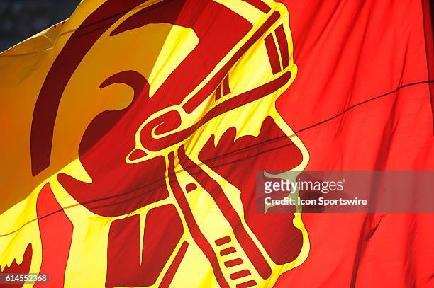 The USC Trojan logo on a flag illuminated by the sun during an NCAA football game between the Fresno State Bulldogs and the USC Trojans at the Los...