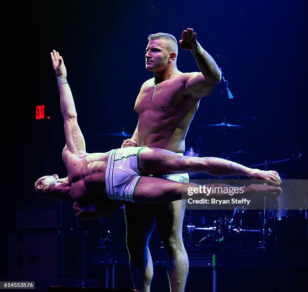 Cast members of the show "Absinthe" perform during the Scleroderma Research Foundations' Cool Comedy - Hot Cuisine fundraiser at Brooklyn Bowl Las...