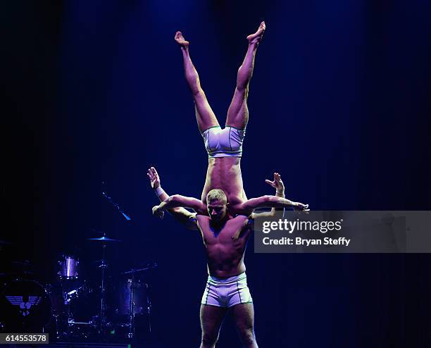 Cast members of the show "Absinthe" perform during the Scleroderma Research Foundations' Cool Comedy - Hot Cuisine fundraiser at Brooklyn Bowl Las...