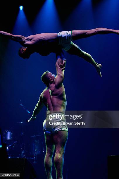 Cast members of the show "Absinthe" perform during the Scleroderma Research Foundations' Cool Comedy - Hot Cuisine fundraiser at Brooklyn Bowl Las...