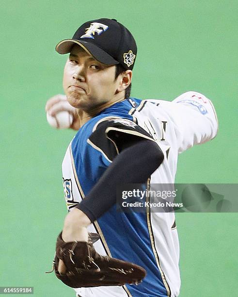 Shohei Otani of the Nippon Ham Fighters pitches against the SoftBank Hawks in Game 1 of the Pacific League Climax Series final stage at Sapporo Dome...