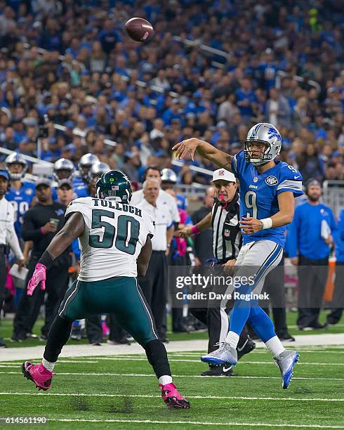 Quarterback Matthew Stafford of the Detroit Lions throws the football over Stephen Tulloch of the Philadelphia Eagles during an NFL game at Ford...