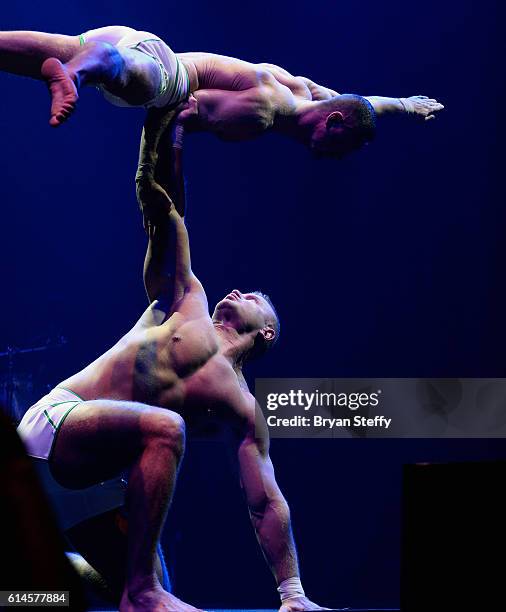 Cast members of the show "Absinthe" perform during the Scleroderma Research Foundations' Cool Comedy - Hot Cuisine fundraiser at Brooklyn Bowl Las...