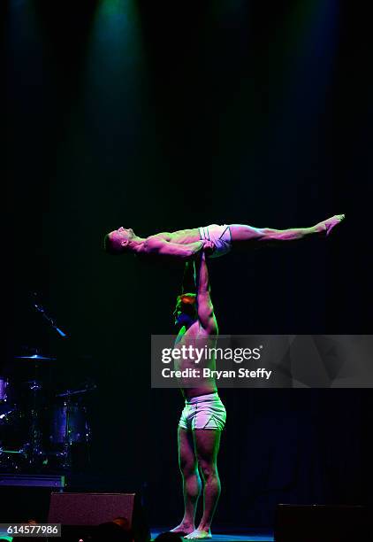 Cast members of the show "Absinthe" perform during the Scleroderma Research Foundations' Cool Comedy - Hot Cuisine fundraiser at Brooklyn Bowl Las...