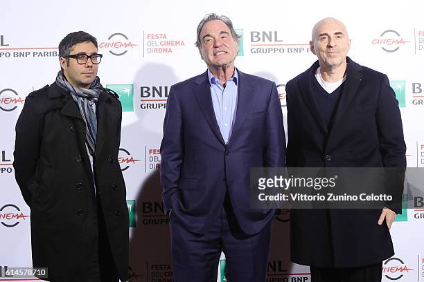 Max Arvelaiz, Oliver Stone and Fernando Sulichin attends a photocall for 'Snowden' during the 11th Rome Film Festival at Auditorium Parco Della...