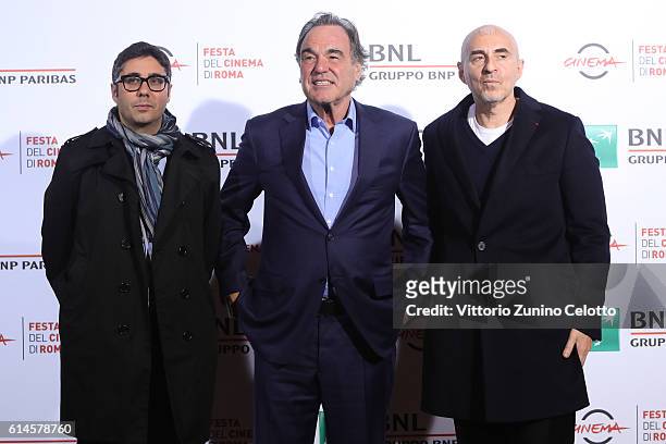 Max Arvelaiz, Oliver Stone and Fernando Sulichin attend a photocall for 'Snowden' during the 11th Rome Film Festival at Auditorium Parco Della Musica...