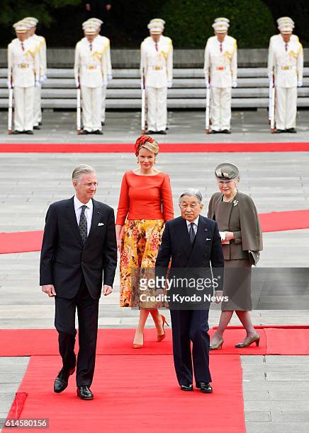 Japanese Emperor Akihito and Empress Michiko attend a ceremony welcoming Belgian King Philippe and Queen Mathilde to Japan at the Imperial Palace in...