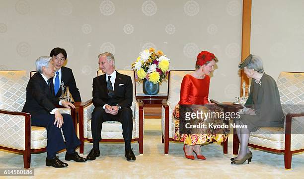Japanese Emperor Akihito and Empress Michiko meet with Belgian King Philippe and Queen Mathilde at the Imperial Palace in Tokyo on Oct. 11, 2016. The...