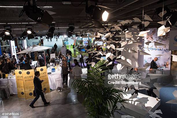 Paper airplanes hang above the Hello Tomorrow technology conference in Paris, France, on Friday, Oct. 14, 2016. Bonnafe said that "one of the...