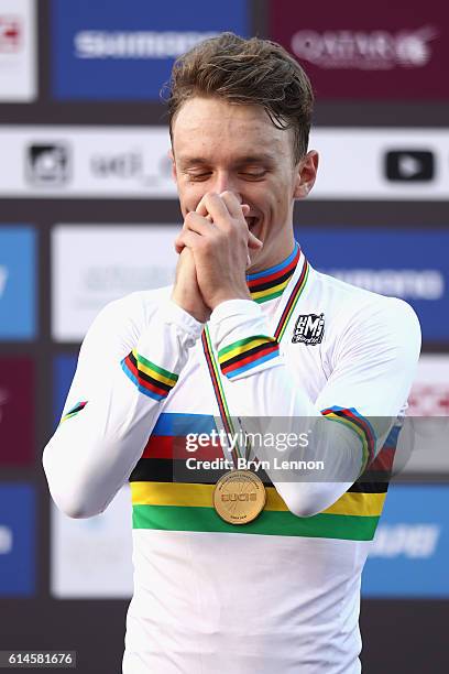 Jakob Egholm of Denmark celebrates on the podium after winning the Men Juniors Road Race on Day Six of the UCI Road World Championships at The Pearl...