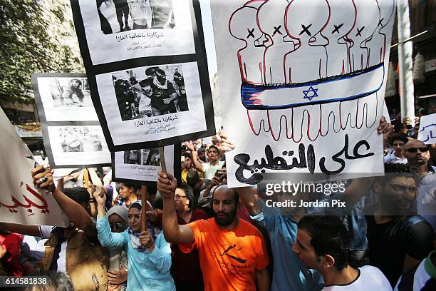 Hunderds of activivists from the coalition of leftist and nationalist parties in Jordan protest against the gas deal with Israel, on October 14 in...