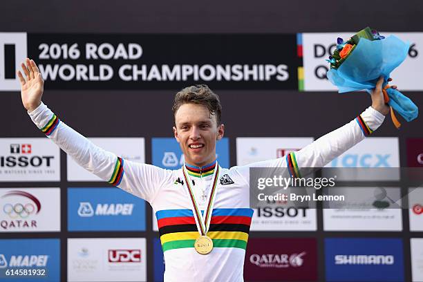 Jakob Egholm of Denmark celebrates on the podium after winning the Men Juniors Road Race on Day Six of the UCI Road World Championships at The Pearl...