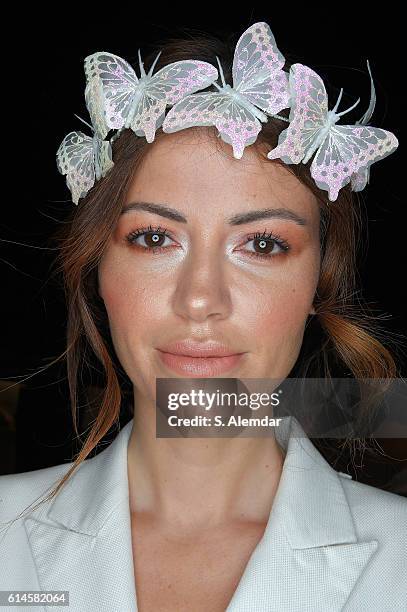 Model backstage ahead of the Affair show during Mercedes-Benz Fashion Week Istanbul at Zorlu Center on October 14, 2016 in Istanbul, Turkey.f