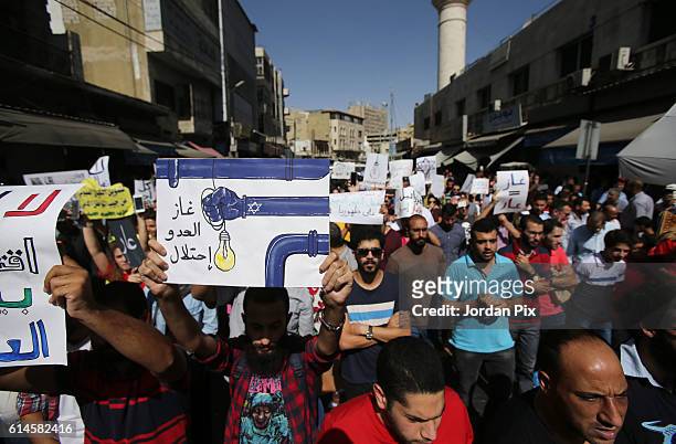 Hunderds of activists from the coalition of leftist and nationalist parties in Jordan protest against the gas deal with Israel, on October 14 in...