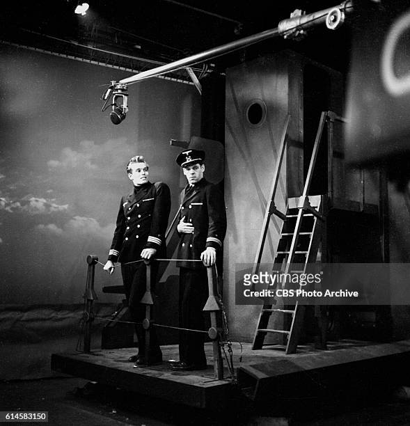 Charlton Heston, left, in CBS televisions dramatic anthology series, Studio One. Episode and production of Battleship Bismarck, originally broadcast...