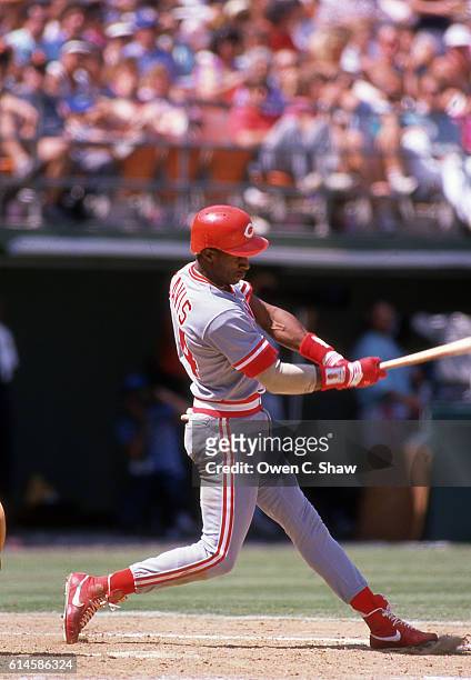 Eric Davis of the Cincinnati Reds circa 1987 bats against the San Diego Padres at Jack Murphy Stadium in San Diego, California.